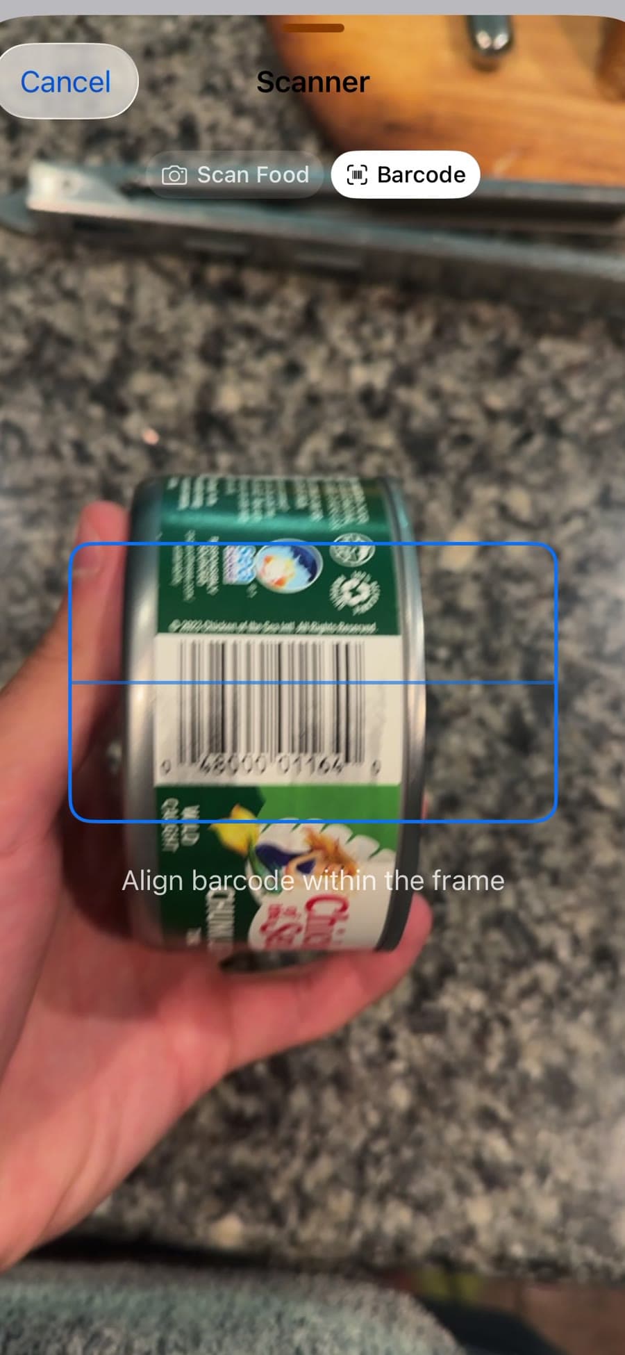 Qyra scanning a product barcode with the camera