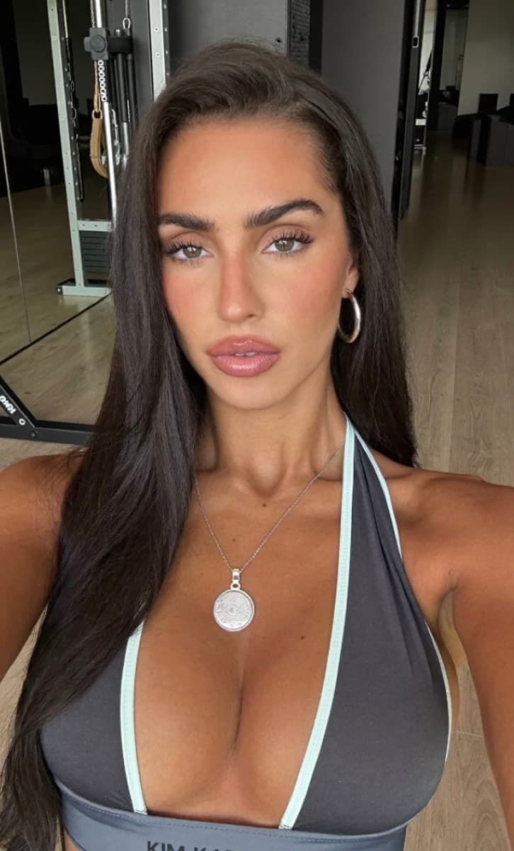 Kim in a gym after using Qyra